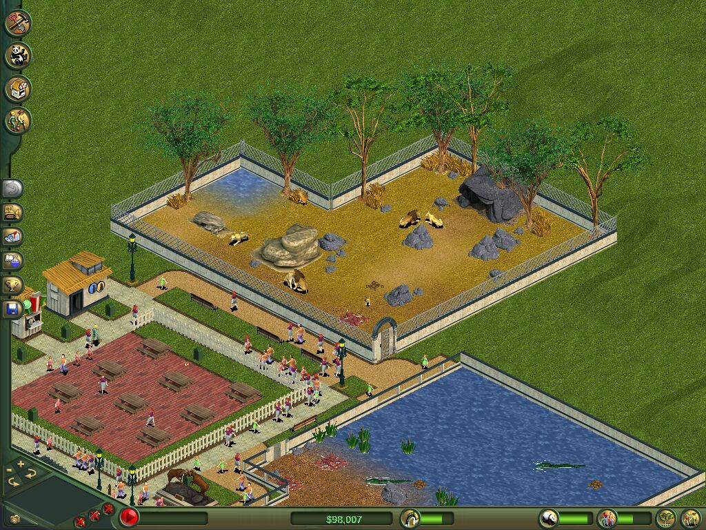 An isometric zoo: a lion exhibit with trees and rocks, a picnic area, a crocodile pond and a crowd of guests on the paths.